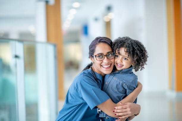 istock Doctor Hugs Little Boy 1417085757