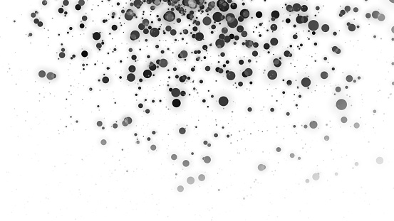 Black Ink Dots on White Background