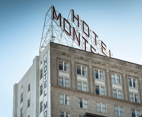 New Orleans, Louisiana USA - November 20, 2021:  Hotel Monteleone historic neon sign on the roof of the building in the French quarter of downtown New Orleans Louisiana USA by the Mississippi river