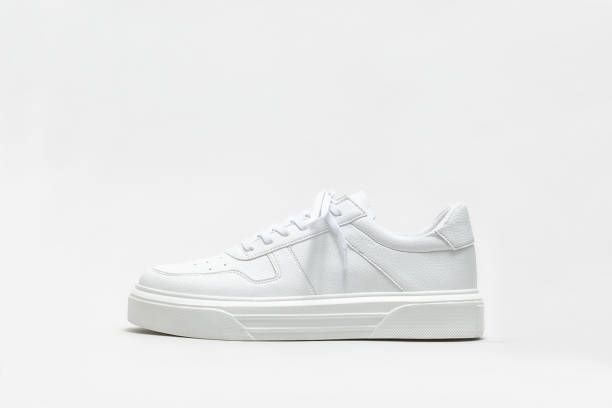 White leather sneaker White leather sneaker on a white background sneakers stock pictures, royalty-free photos & images