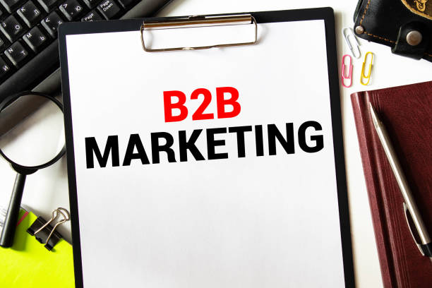 istock B2B Marketing word on paper and magnifying lens. 1417095685