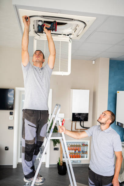 istock Workers checks the air conditioner 1417100315