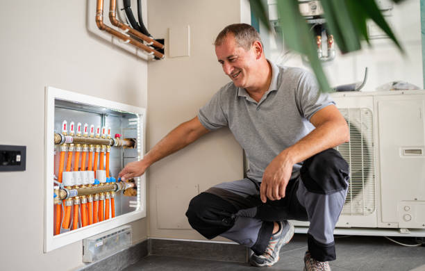 technician checking the pipes' diagnostics - heating engineer imagens e fotografias de stock