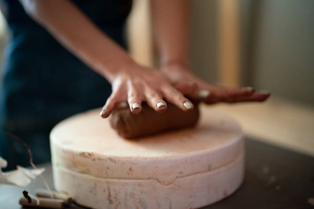 istock Close up to Kneading ceramic dough 1417101557