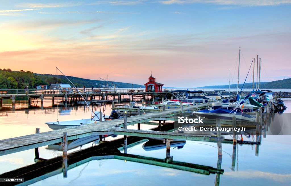Seneca Lake in Watkins Glen, New York Watkins Glen is a village in and the county seat of Schuyler County, New York. Watkins Glen is located on the southern shore of Seneca Lake in  New York's Finger Lakes Region. Color Image Stock Photo
