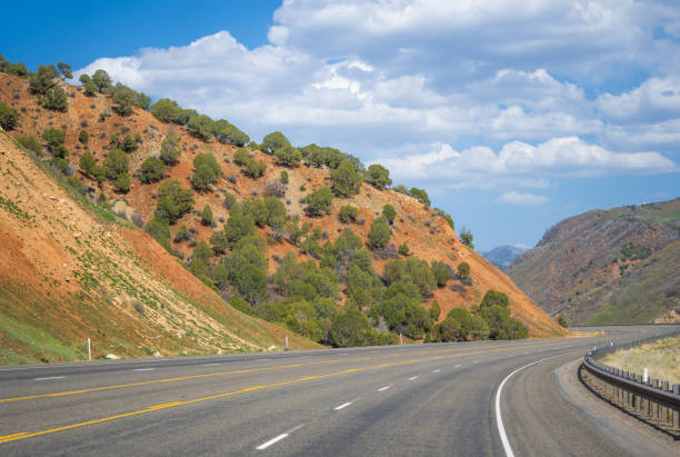 istock Multiple line highway thru the mountains in Utah, USA 1417112723