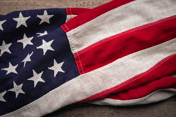 istock Vintage American Flag on Rustic Wood 1417144761