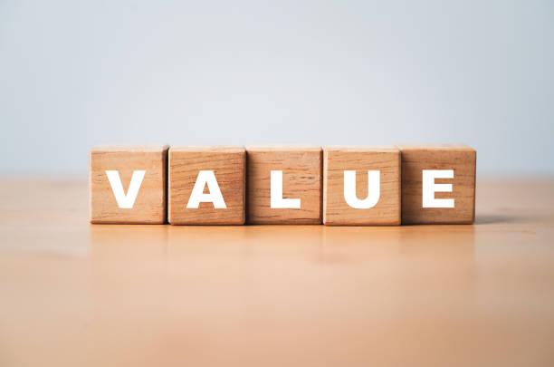 istock White value wording print screen on wooden cube block. 1417147273