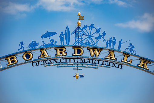 Ocean City, MD/USA - August 3, 2022: Close up of the metal Boardwalk entrance sign in Ocean City, Maryland