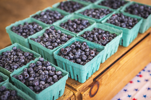 Pints of fresh picked blueberries for sale at a Rhode Island farmer's market