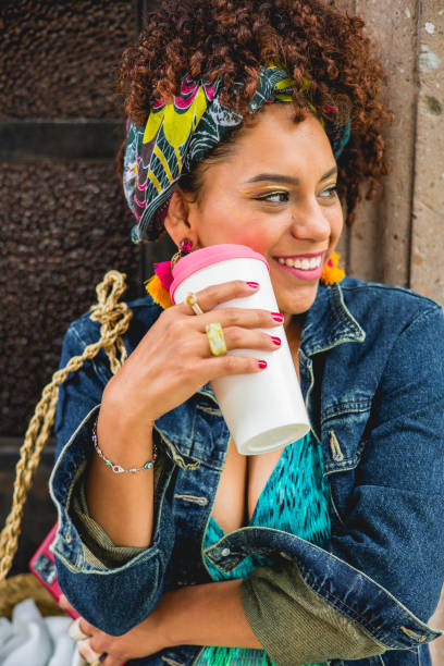 istock Portrait to a woman with coffee 1417176130