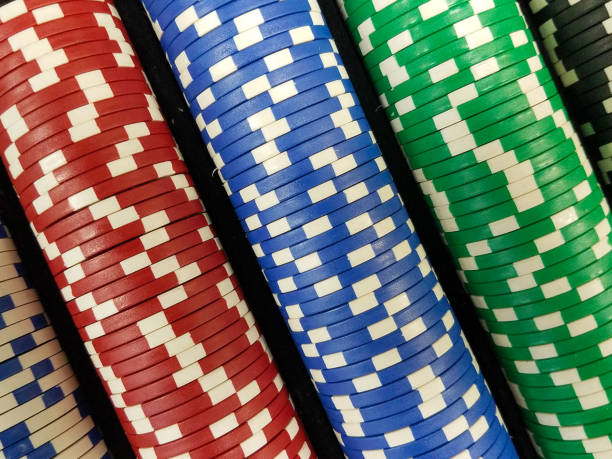 Close up of multi colored poker chips.