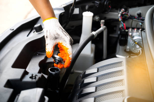 istock Hands wearing cloth gloves for auto mechanics.Hands tools with Auto mechanic concept. 1417182195