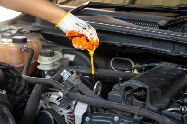 istock Hands wearing cloth gloves for auto mechanics.Hands tools with Auto mechanic concept. 1417182214
