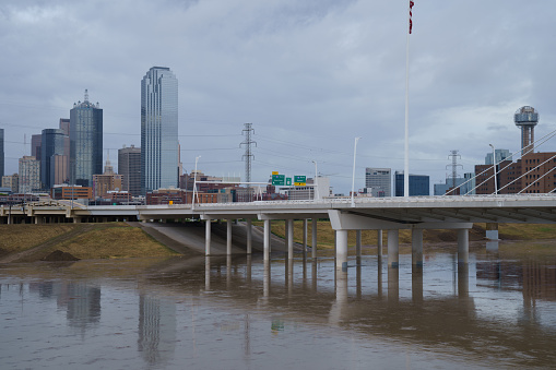 The Trinity River is out of the banks and is being contained by the levees on the evening of August 22, 2022. This is after the historic rainfall that began on August 21, 2022.