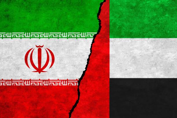 istock Iran and United Arab Emirates flags on a wall with a crack 1417186201