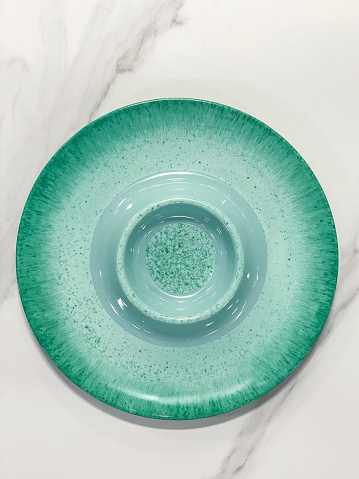 Empty Plate on marble counter top