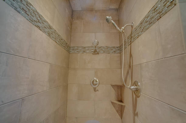 istock Luxurious shower with large tiles and clean lines 1417190111