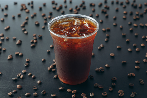 Cold Brew Coffee on Black Background with Coffee Beans
