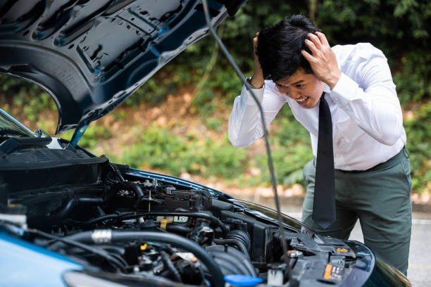istock Asian businessman car broken breakdown 1417207435