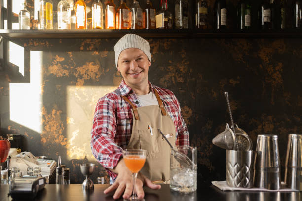 istock Barman at work, preparing cocktails. concept about service and beverages. 1417214076