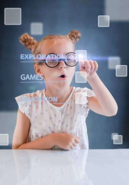 istock Little Funny Nerd Girl Taps the Virtual Screen 1417215216
