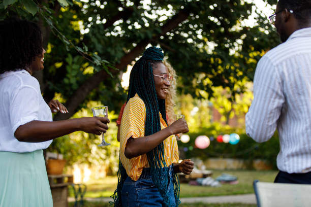 istock Cheerful friends dancing during a summer garden party 1417224036