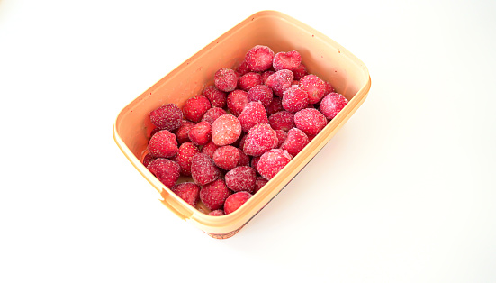 Ready to eat, frozen strawberries in a box