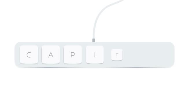 Capital word written with computer buttons over white background