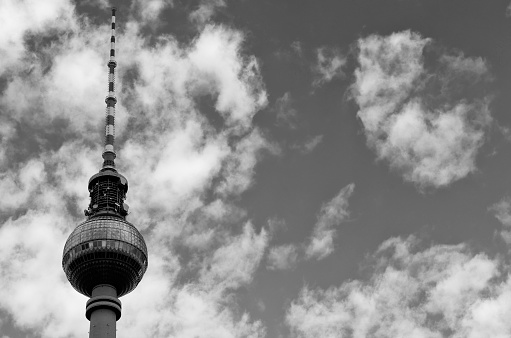 The famous TV Tower on a dramatic sky. Alexanderplatz, Berlin, Germany. Copy Space.