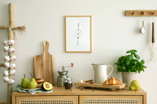 istock Creative composition of kitchen space with rattan commode,  ladder, pears, food and kitchen accessories in modern home decor.  Template. 1417260448