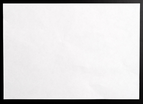 Clear empty white paper on black background