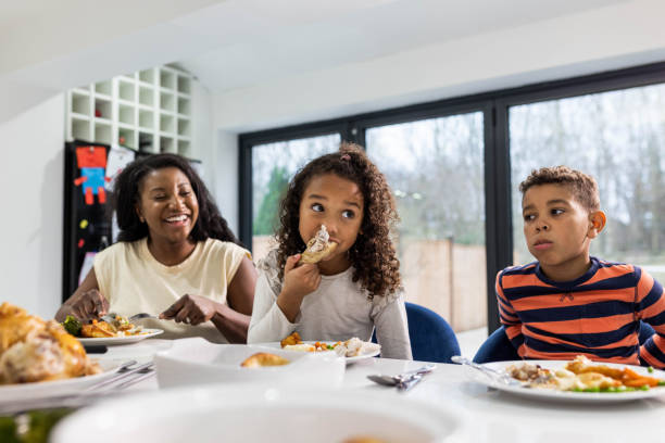 istock Family Time Around The Kitchen Table 1417268143