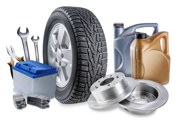 istock Tools and objects for car repair and service, such as a wheel; battery; oil in a container; keys on a white isolated background 1417279031