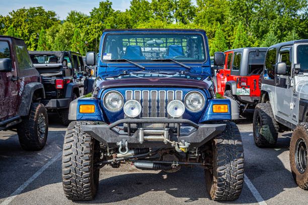 Pigeon Forge, TN - August 25, 2017: Modified Jeep Wrangler Sport TJ Soft Top at a local enthusiast rally.