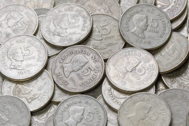 Flat Lay close up of old Five Piso Philippine Coins