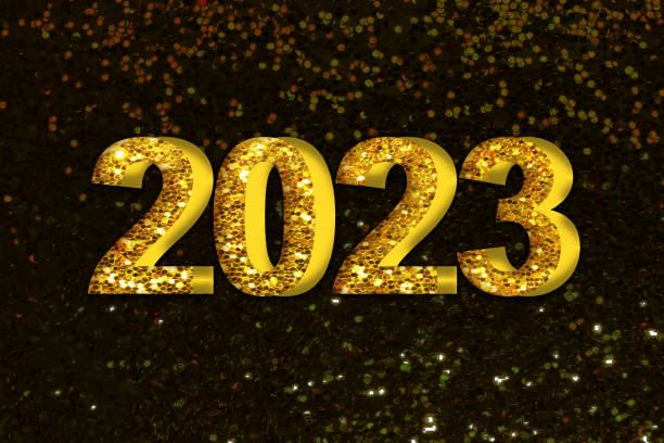 istock Golden number 2023 on dark glittering background with place for text . 1417297441