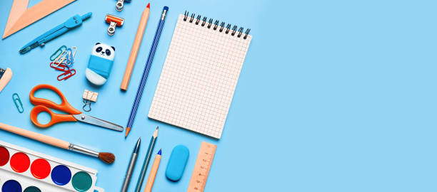 istock School supplies on blue background, copy space for text 1417305184
