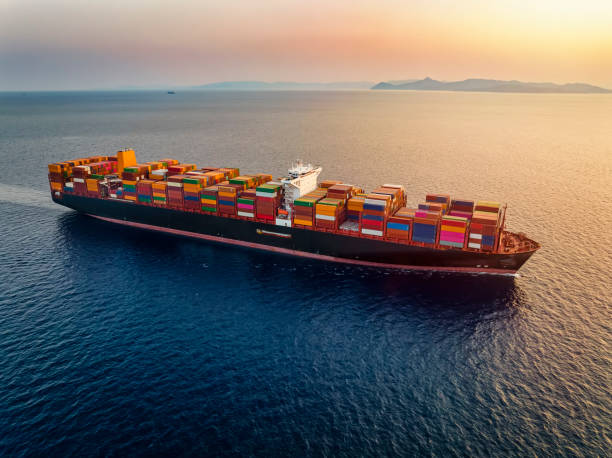 istock Aerial sunset view of a large container cargo ship 1417308908