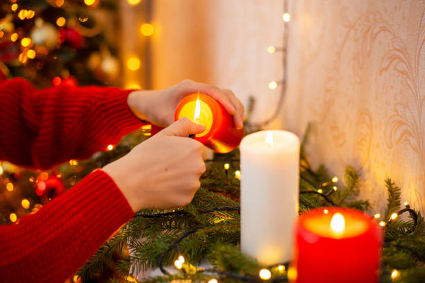 istock Celebrating Christmas time with candles 1417309287