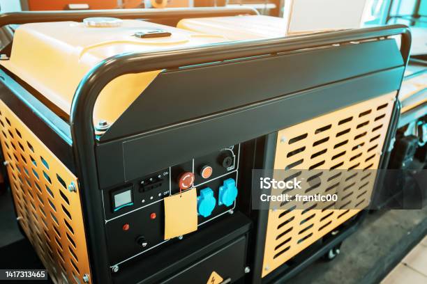 Portable Mobile Diesel Alternator As A Backup Power Source For Electric Home Appliances Stock Photo - Download Image Now