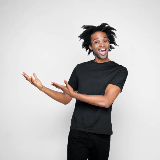 istock Portrait of happy man pointing at copy space 1417314309