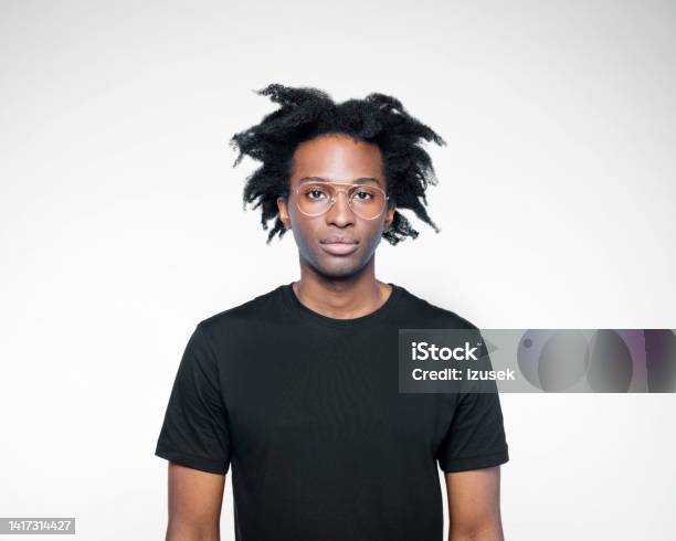 Portrait Of Man In Black Outfit Stock Photo - Download Image Now - Men, Black Color, Contemplation