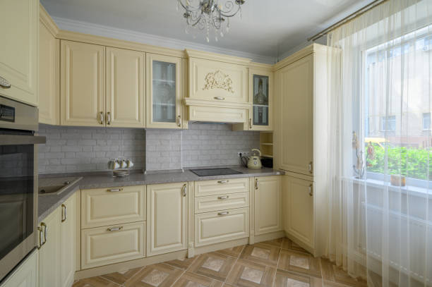 istock Interior of modern trendy cream colored kitchen 1417314609