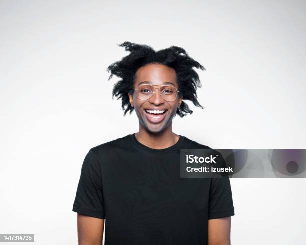Potrait Of Happy Man In Black Outfit Stock Photo - Download Image Now - African-American Ethnicity, Black Color, T-Shirt