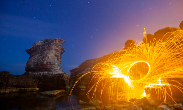 istock Night star exposure and steel wool shot , Kerpe devil cliffs , Kocaeli 1417317964