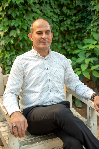 istock Handsome man posing outdoors 1417319428