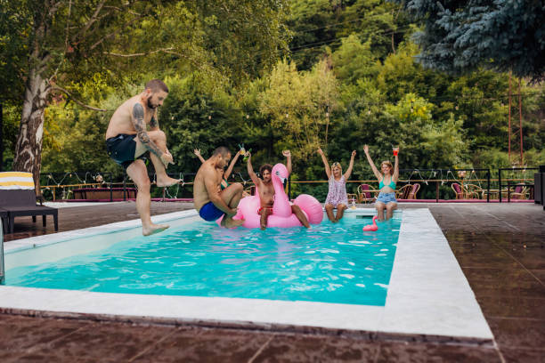 istock A small group of friends having fun at a pool party 1417327558