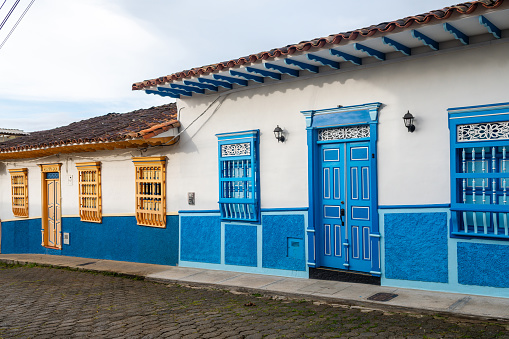 colorful houses in row at jerico street , colombia