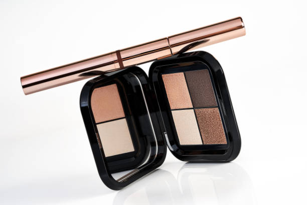 istock Make-up Products, Eye Shadows  palette and Mascara  over a white background. 1417329165